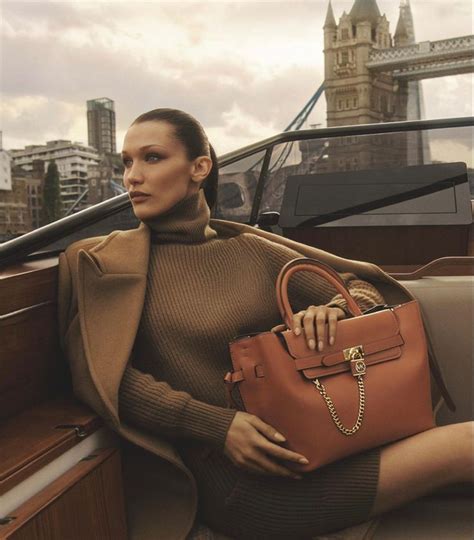 michael kors bella hadid contract|Michael Kors Unveils Fall 2022 Ad Campaign with Bella Hadid.